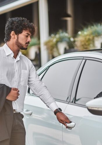 indian-businessman-opens-car-door_496169-2780 indian-businessman-opens-car-door_496169-2780